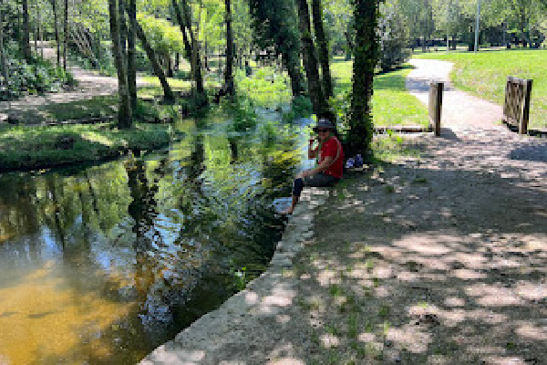 soaking tired feet on the Camino Ingles